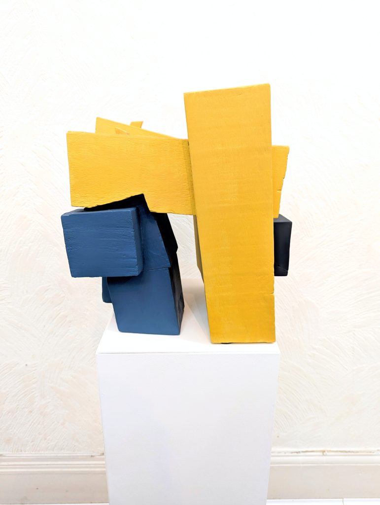 Man digging. Made from wood. Made from salvaged wood.